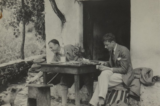 A snapshot of Robert Byron and dining companions, 1927, from the Robert Byron Papers.