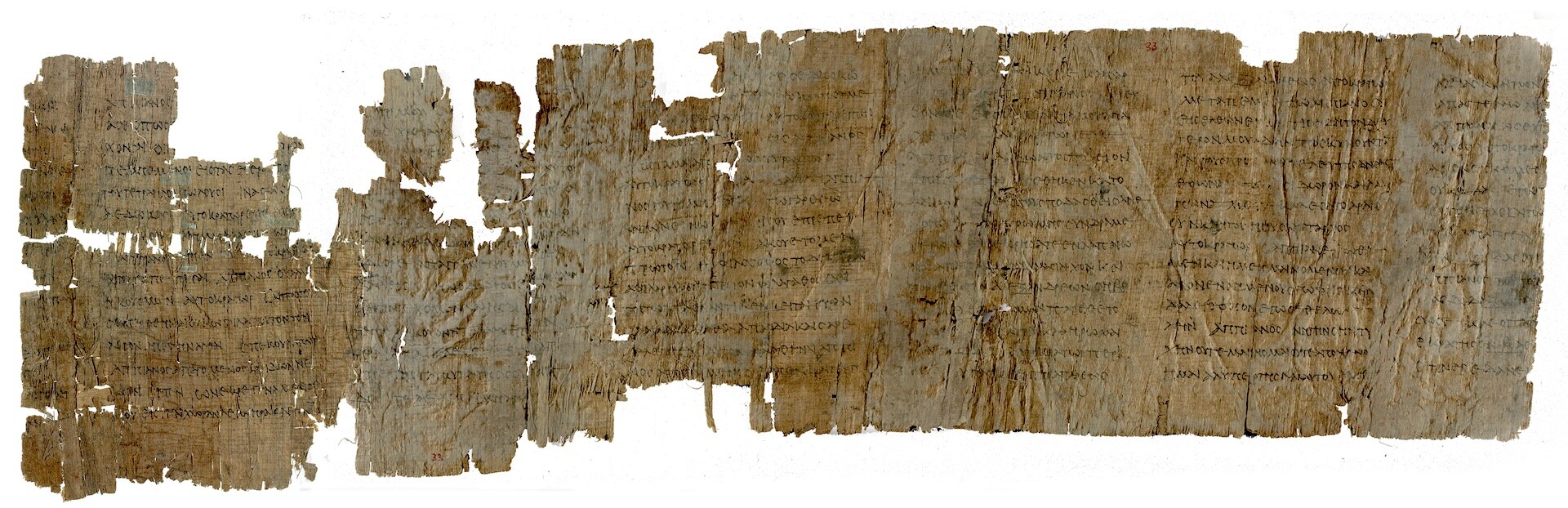Two fragments of papyrus digitally joined together.  Papyrus is brown with light black ink. Contrast enhanced.