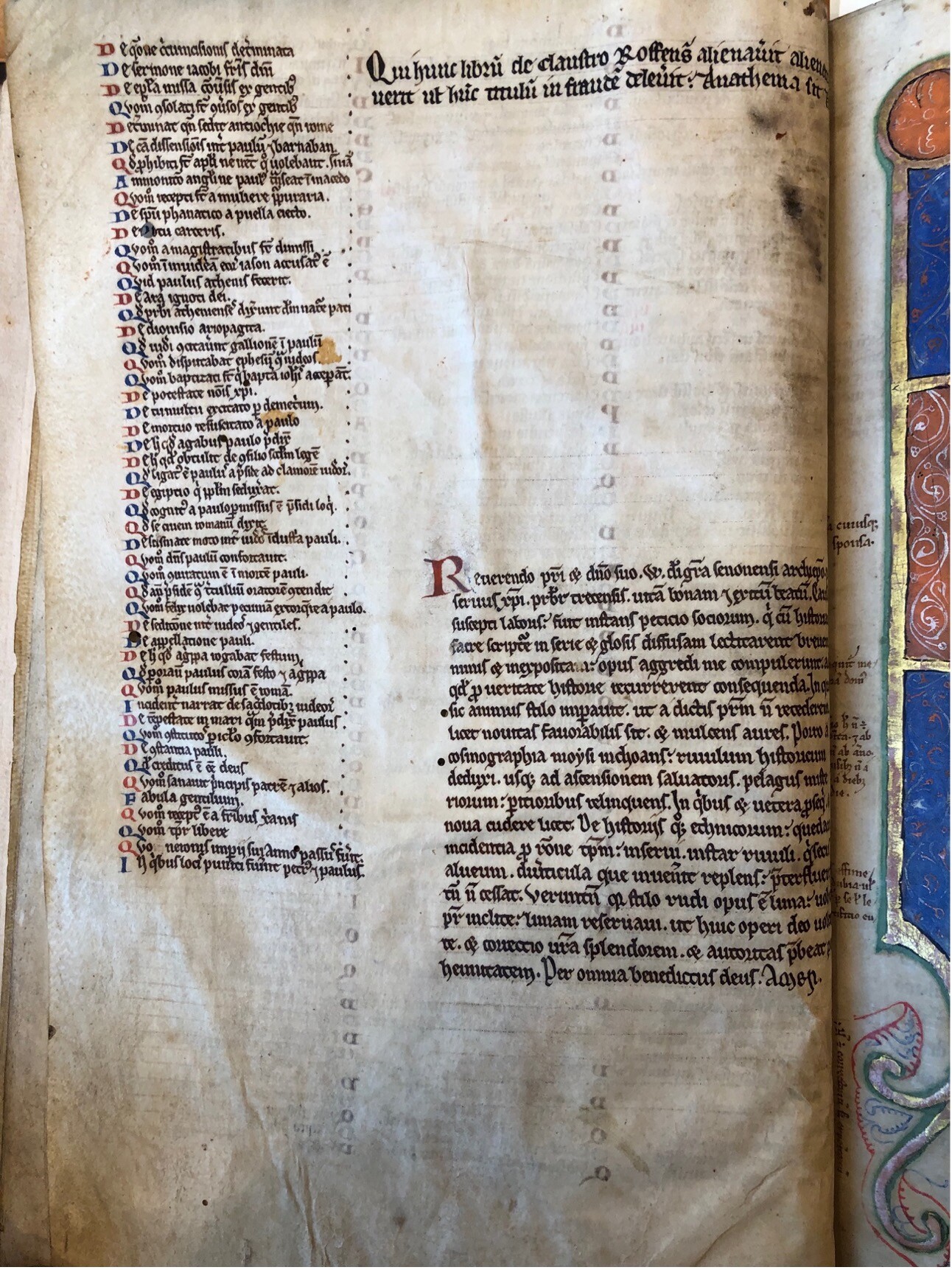 A page of a medieval manuscript featuring text in black with red and blue initials.