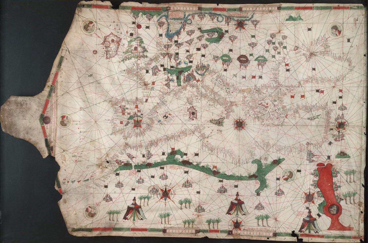 Map of Mediterranean drawn with brown, green, and red ink on parchment. Portolan chart made by Judah Ben Zara, 1505.